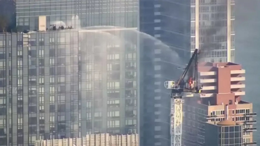 New York City construction crane catches on fire before&nbsp;collapse