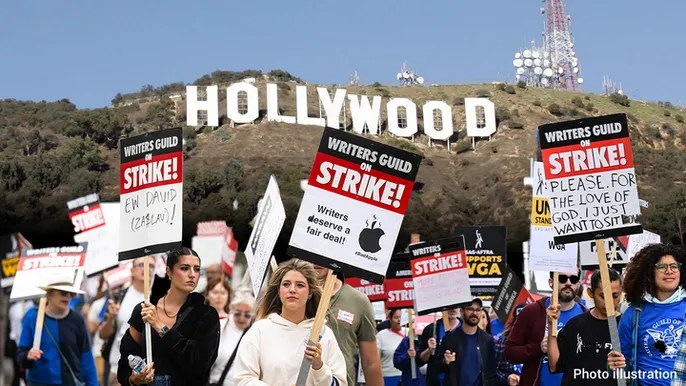 Writers Guild of America reaches tentative agreement with Hollywood studios, suspends&nbsp;picketing