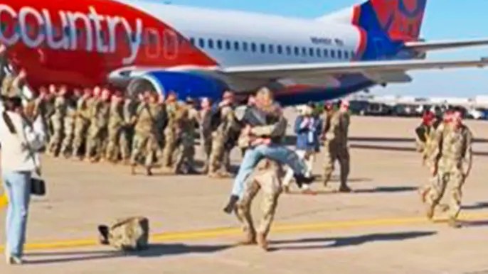 Woman jumps into Nebraska soldier’s arms as troop returns from deployment for Christmas in heartwarming&nbsp;video