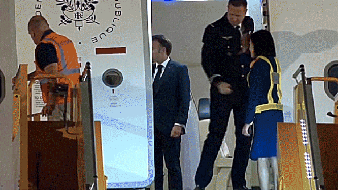 Emmanuel Macron’s wife seen shoving him in the face in viral clip as France’s first couple arrives in Vietnam